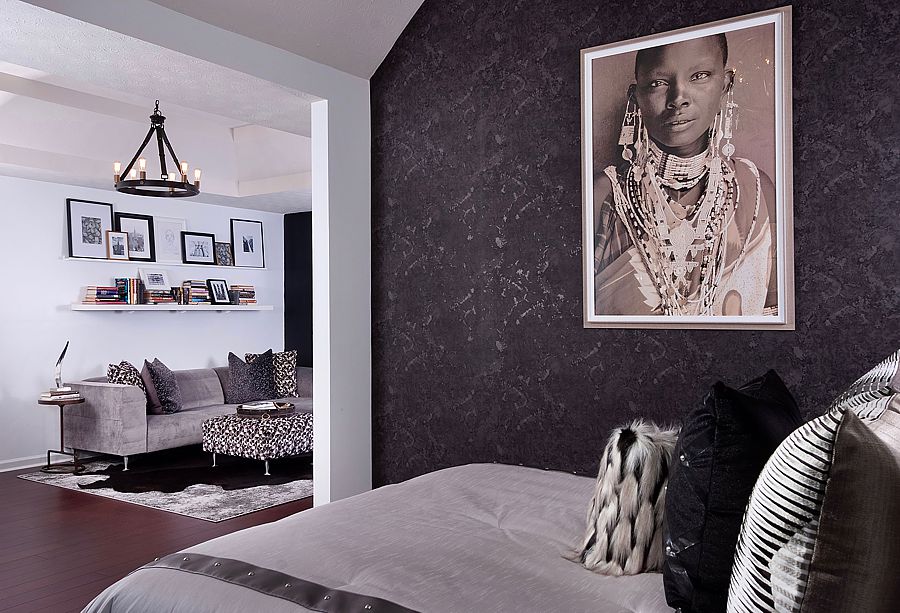 Dark wallpaper in a bedroom nook separates the space s well as giving it a moody feel.